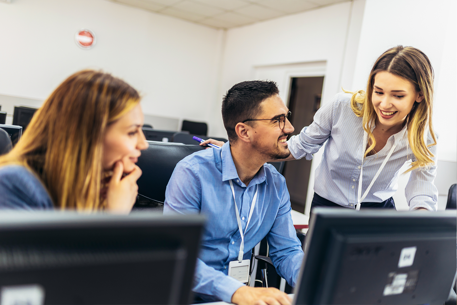people working behind computers
