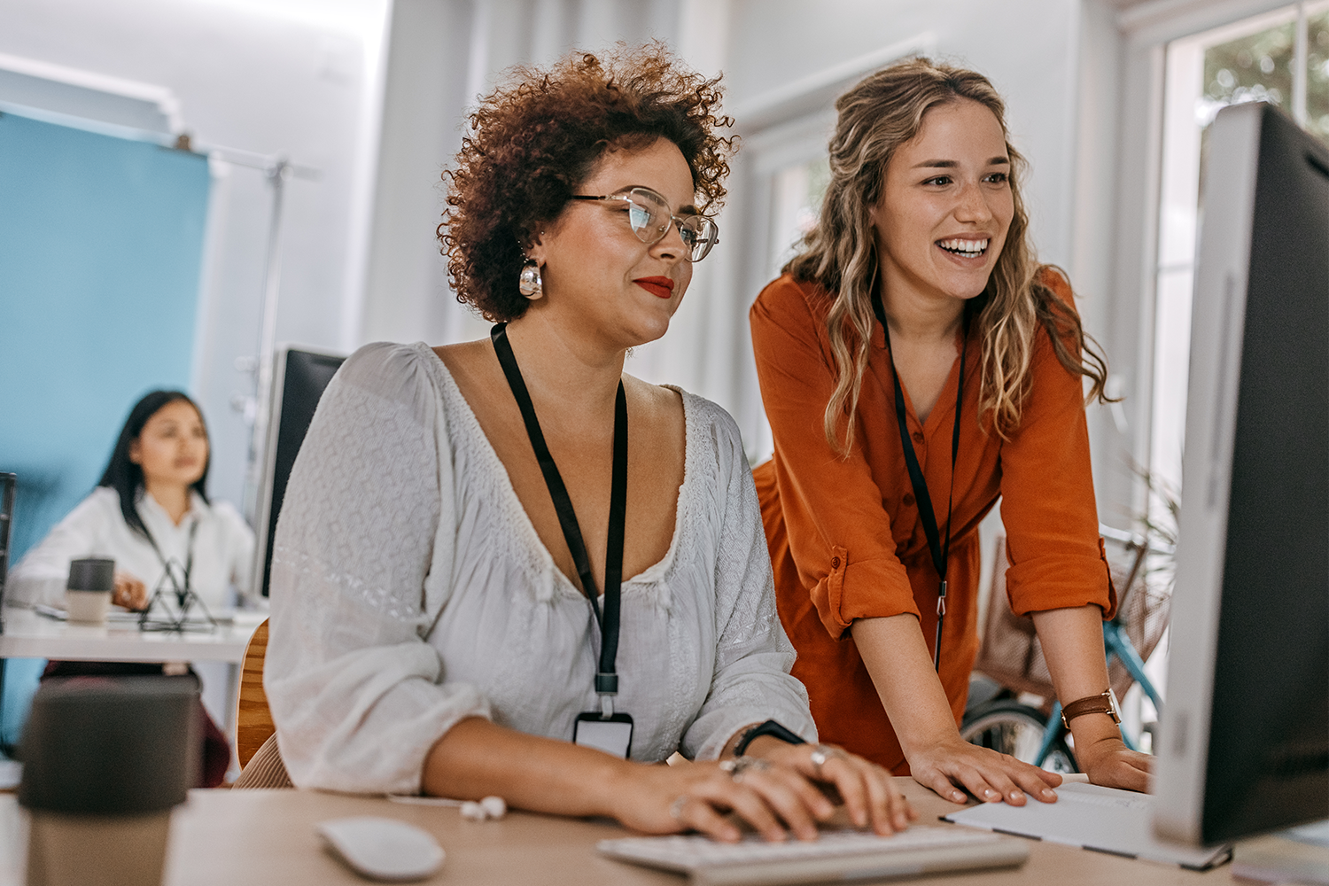 people working together at computer
